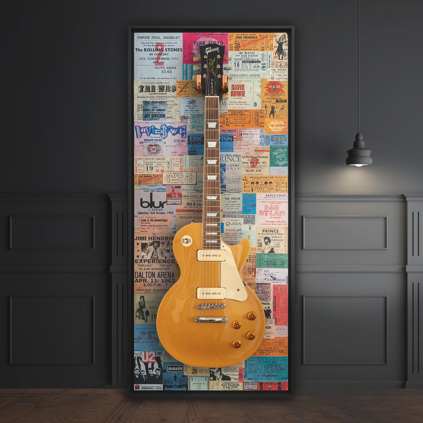 Wall mounted framed guitar hanger featuring iconic concert tickets