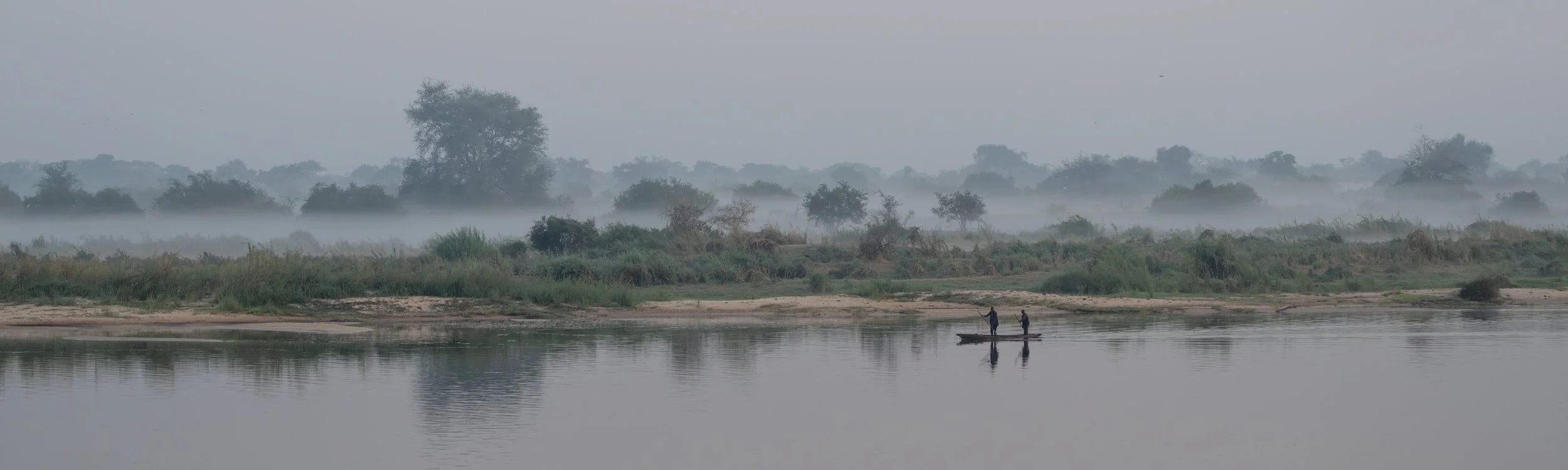 View of the Zambezi in the early morning from Namibia, towards Zambia.