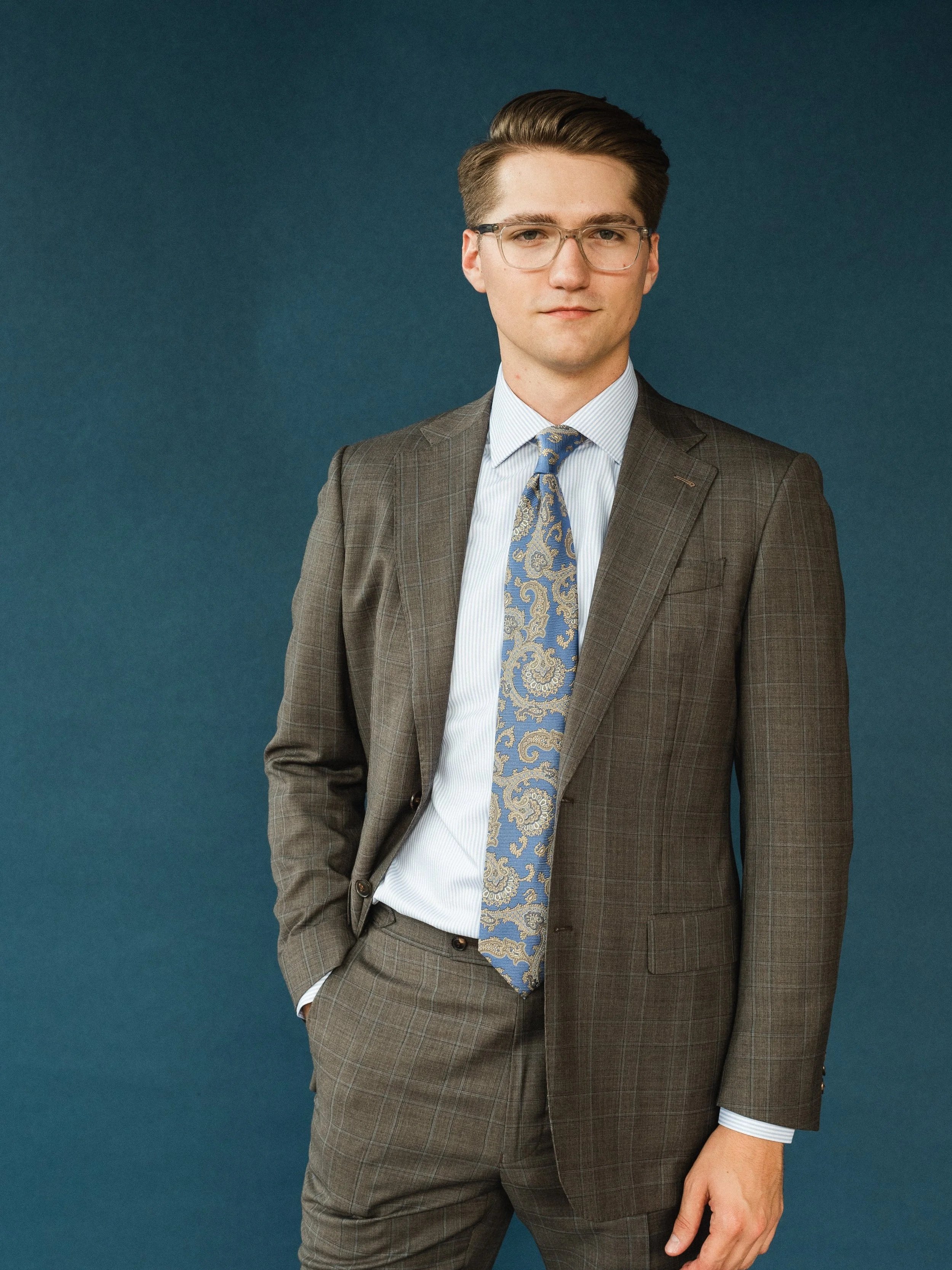 brown plaid suit with shirt and tie