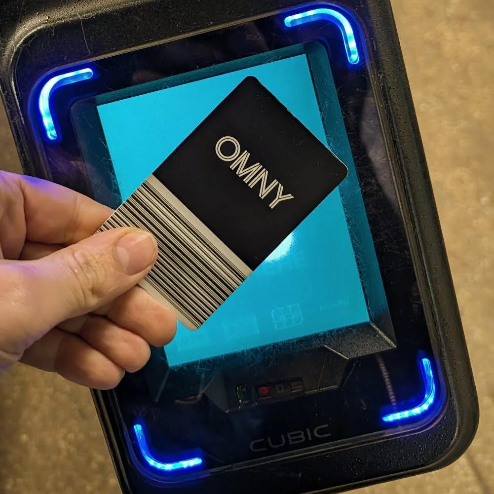 Tapping into the subway with an OMNY card.