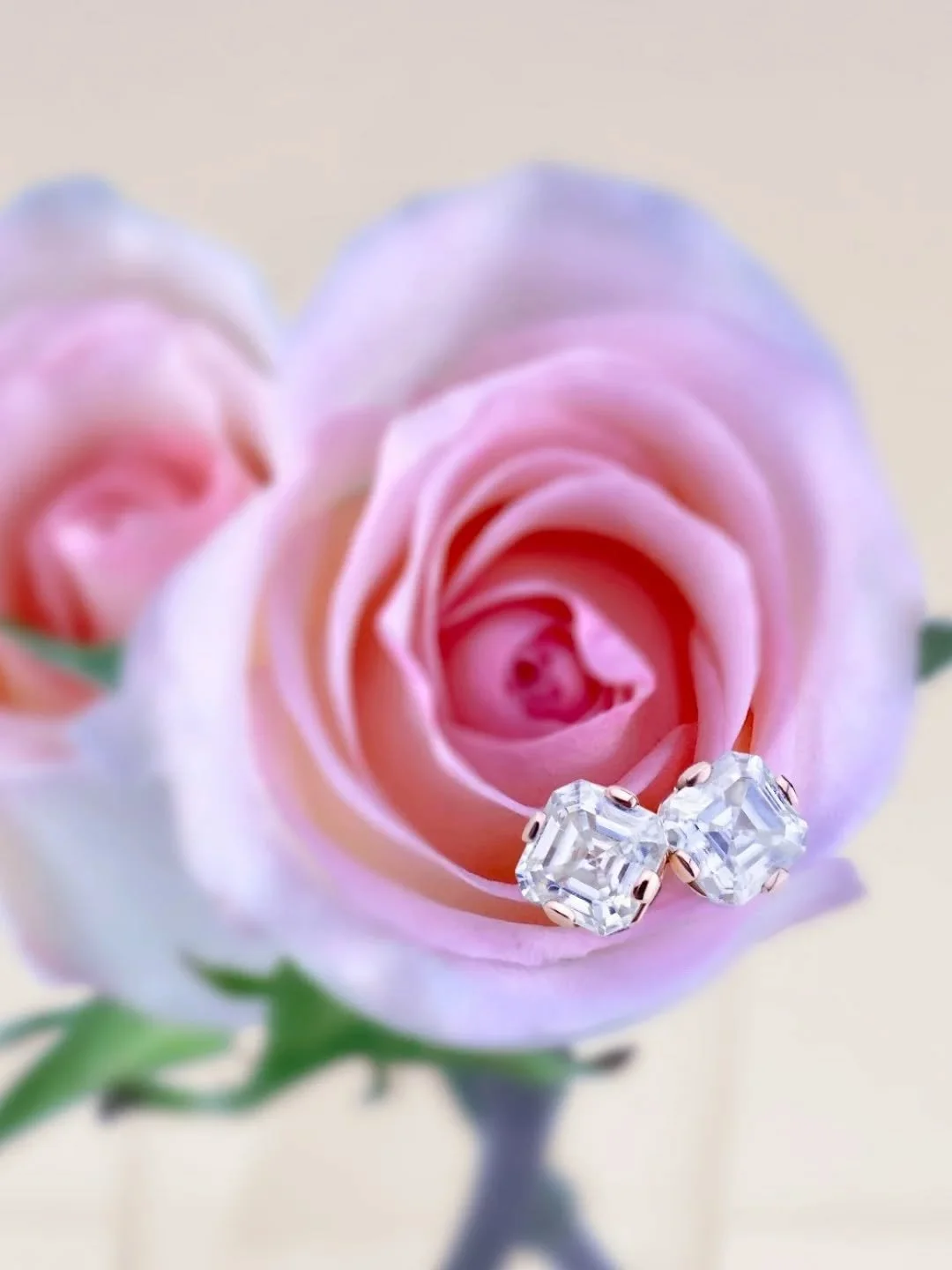 Vintage Art Deco elegance meets modern minimalism. Asscher cut diamonds in rose gold. 

These studs are quiet luxury at its best.

Square step-cut diamonds with cropped corners create a "hall of mirrors" effect&mdash;long, mesmerizing flash