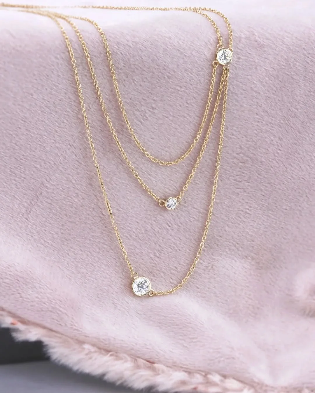 Remember the symmetrical 3-stone pendant from the 2000s? It was everywhere!

This client's version sat unworn for years until we reimagined it. Same diamonds, completely new energy. Layered, whimsical, made to be worn again.

Book a complimentary con