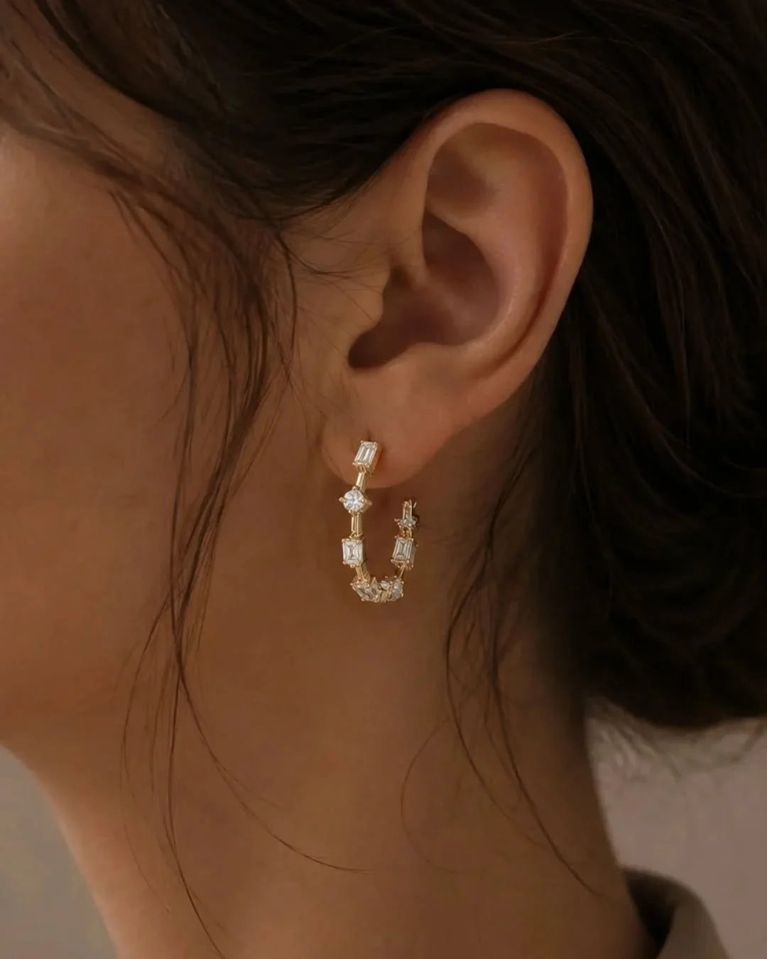 This ring already had beautiful diamonds, so the redesign was really about giving them a new life.

We opened the piece up into a pair of hoops that feel modern, a little playful, and much easier to wear every day.

Different diamond cuts, a bit of m