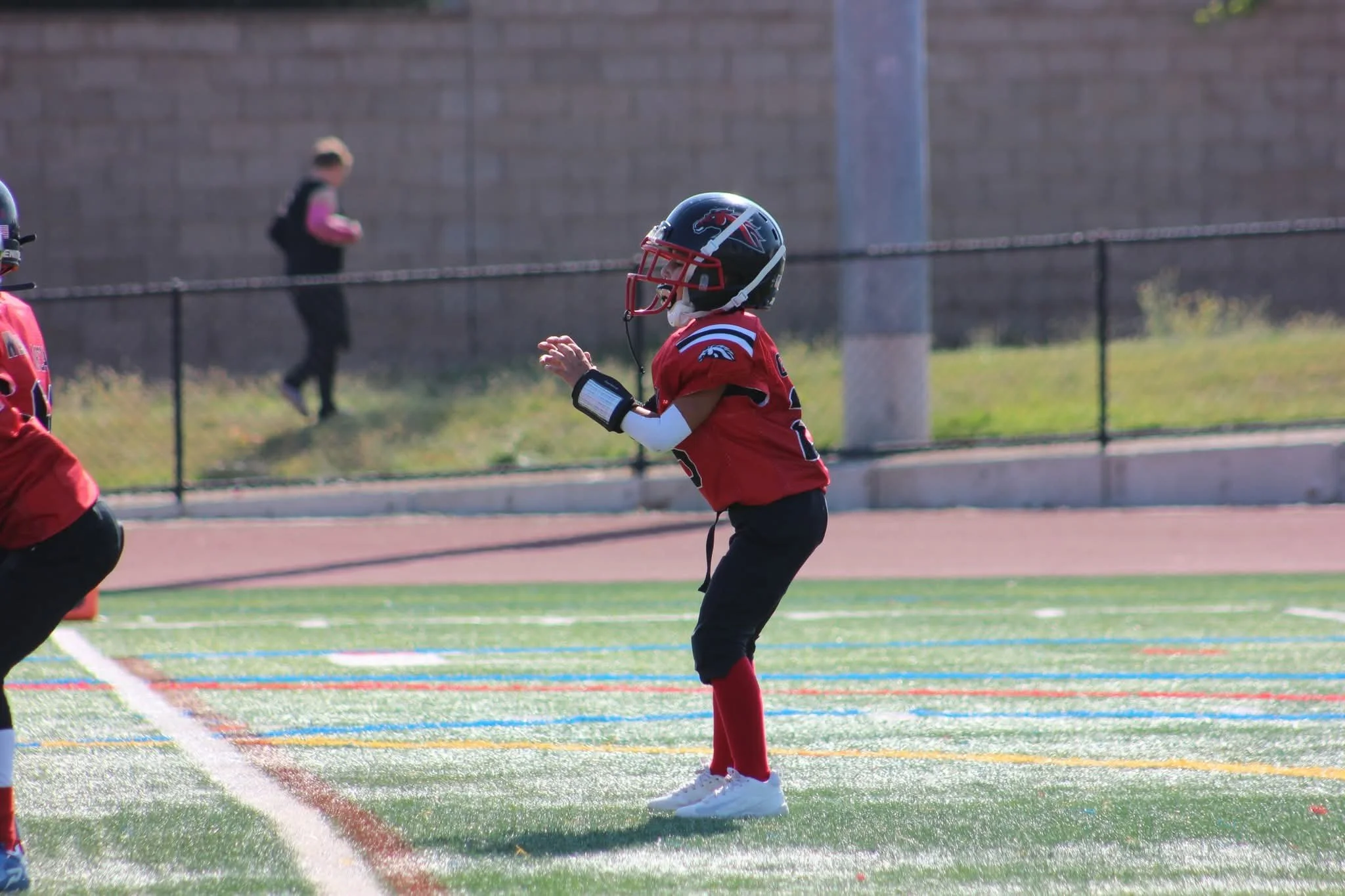 Quarterback ready to hike the football.