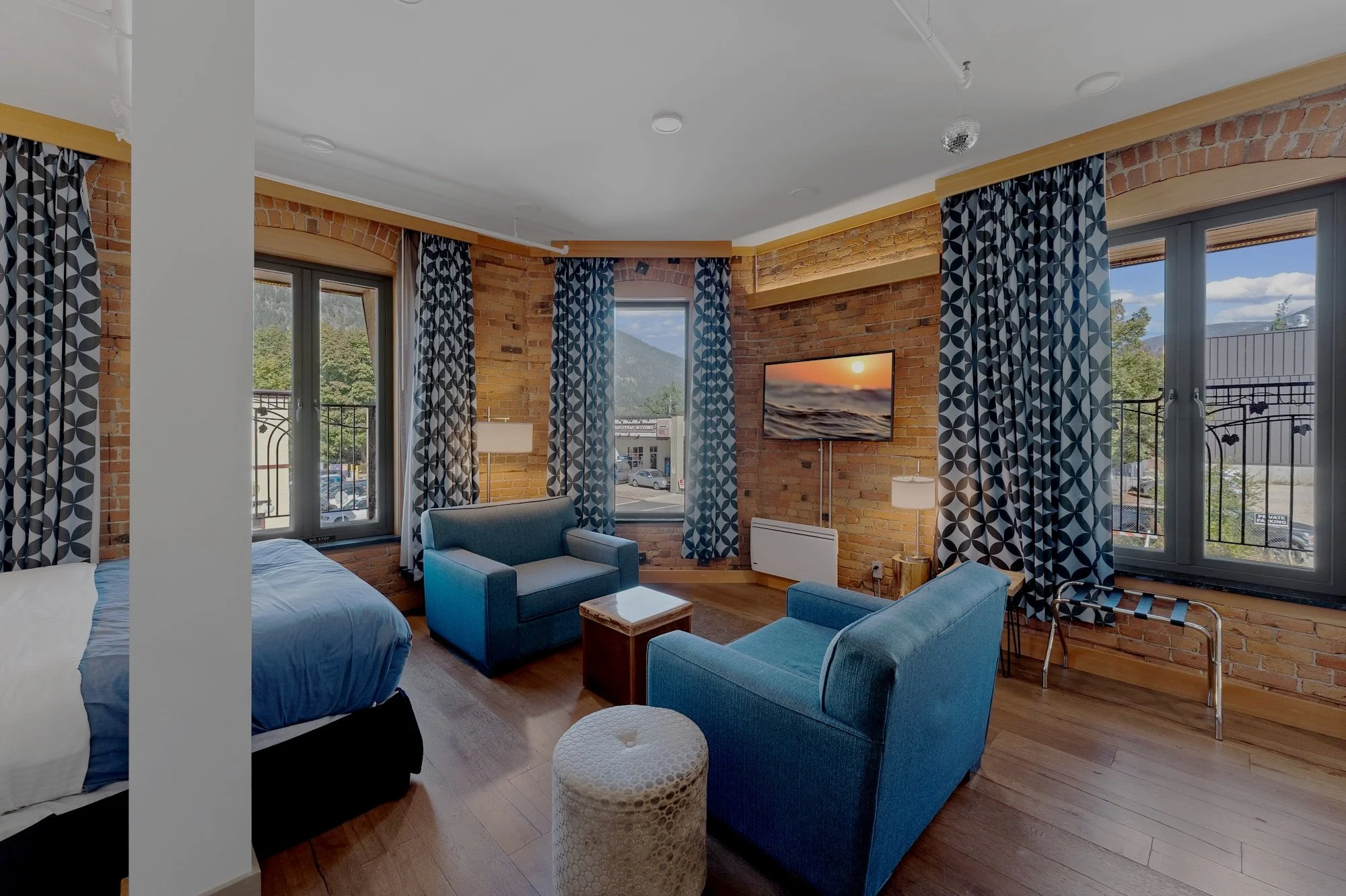 Two chairs and coffee table in a Savoy Hotel Suite in Nelson BC.