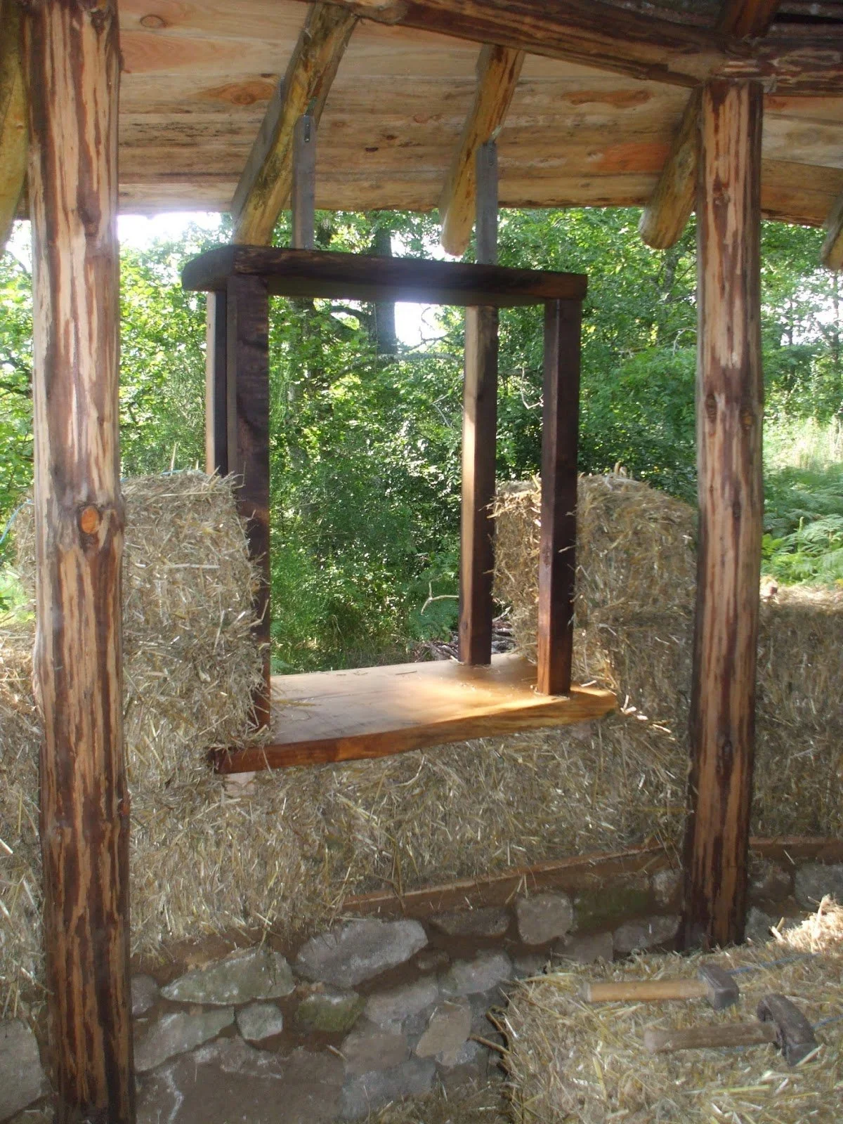 Straw bale wall with window frame