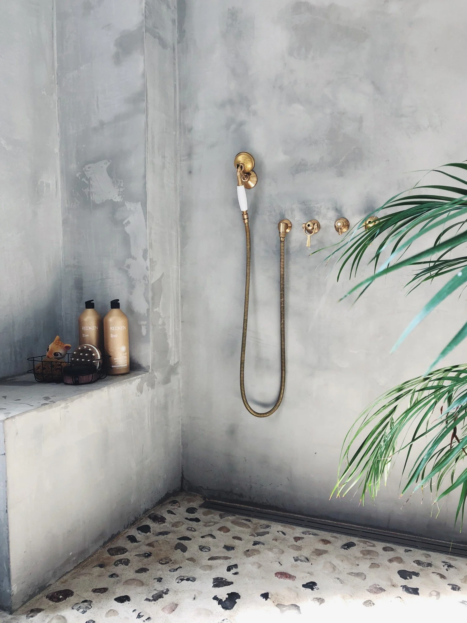 Shower benches and tadelakt plaster are beautiful and functional for people with various physical capabilities