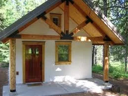 Straw bale home with clay plaster finish on exterior walls