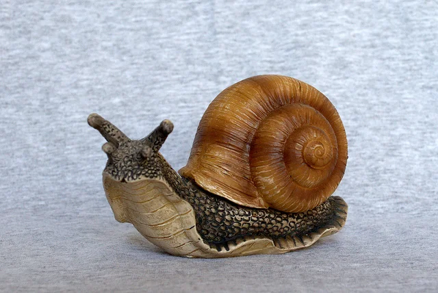 Snails’ Pace Growth to Keep Fed on Sidelines