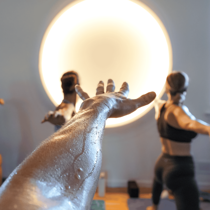 5 Reasons to Take Heated Classes in the Summer (and How to Do It Safely)