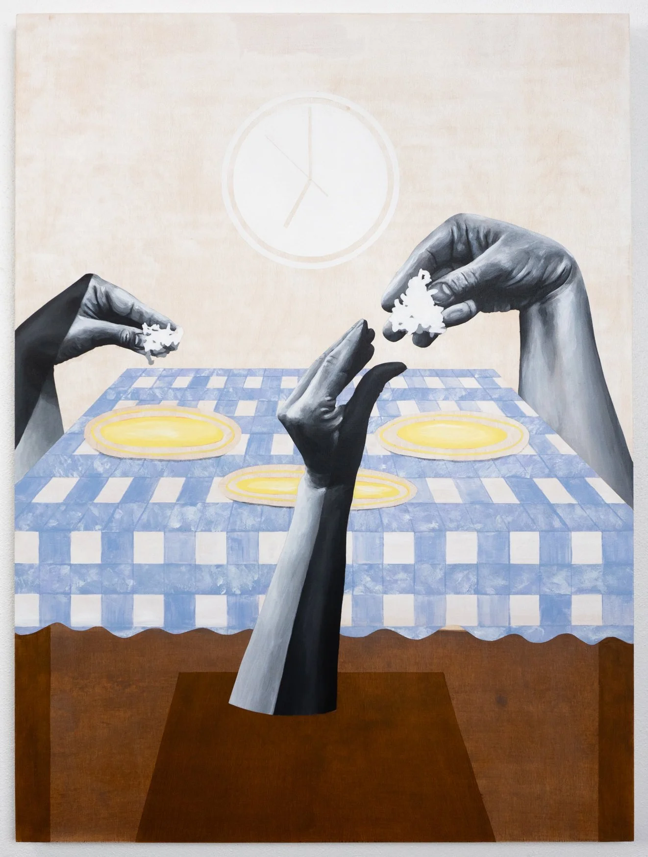April Werle, "Food tastes better this way.", 2023, 40 × 30 in. Three grayscale hands eat rice by hand above a gingham tablecloth with three yellow plates. From Halo-Halo: The Mixed Children.
