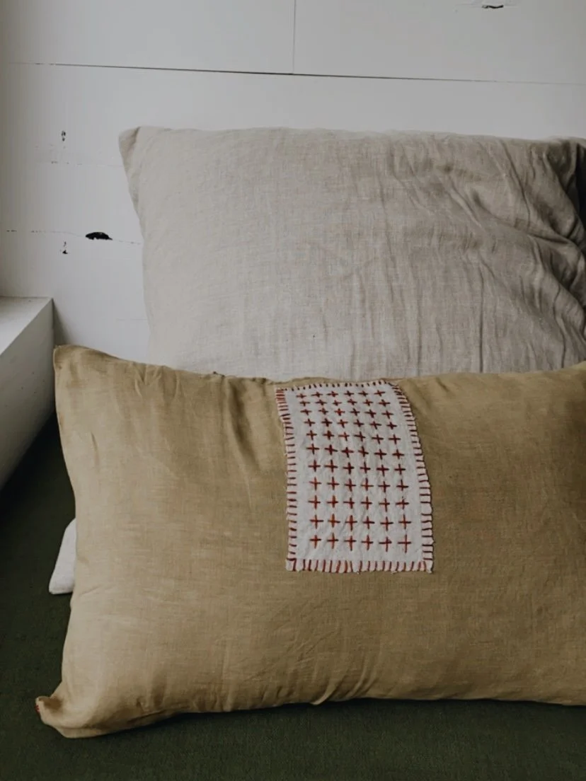 Patch-mend-on-cushion-Nat-Mendham-1-min.jpg