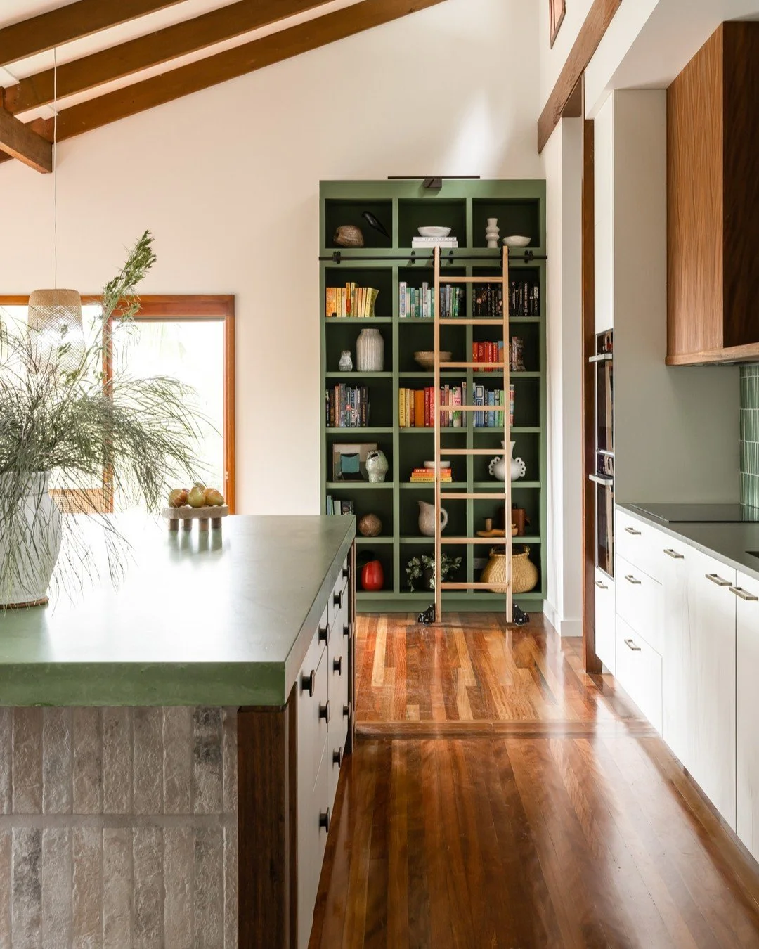 There is so much we love about this photo of our Greenhouse project..... the tiled island, the green concrete bench, the green bookcase with library ladder and those ceilings! 

Interiors by @nerida_thorburn_design
Photography by @simonwhitbreadphoto