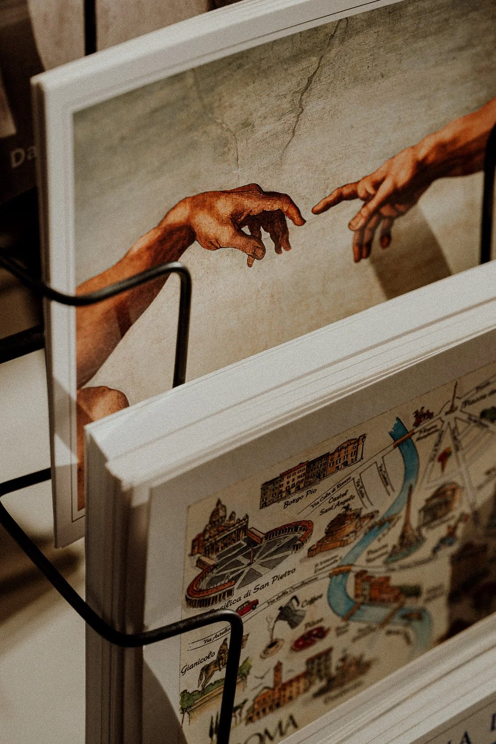 Sistine Chapel Postcards on Display Rack.jpg