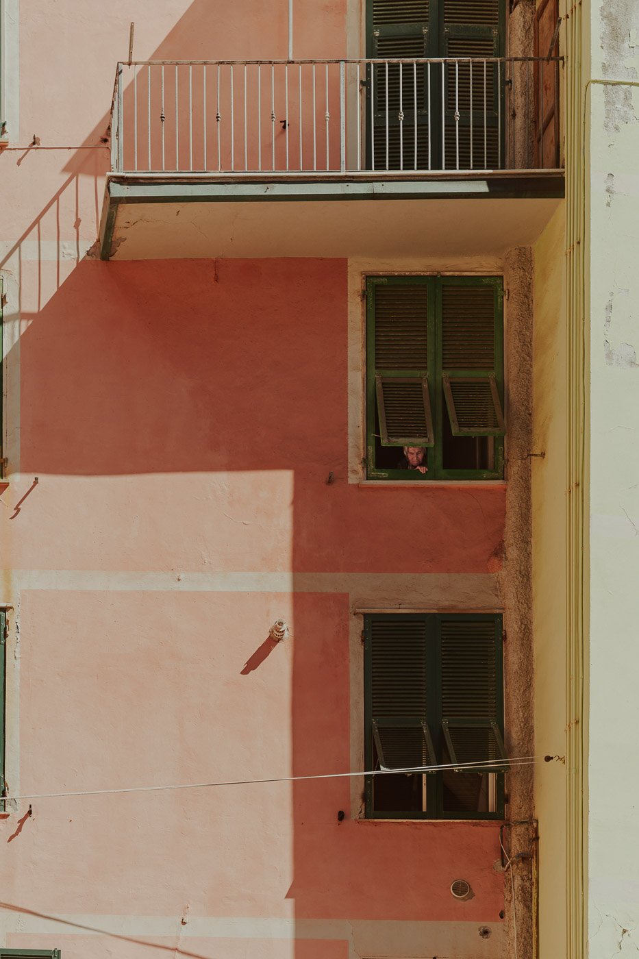 Nonna watching from window in Cinque Terre.jpg