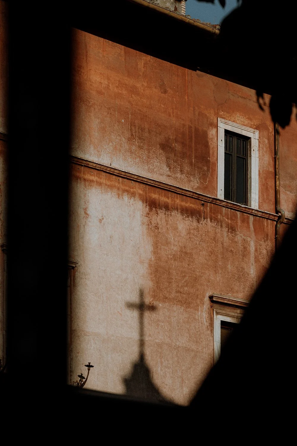 Cross Shadow on Terracotta Wall.jpg