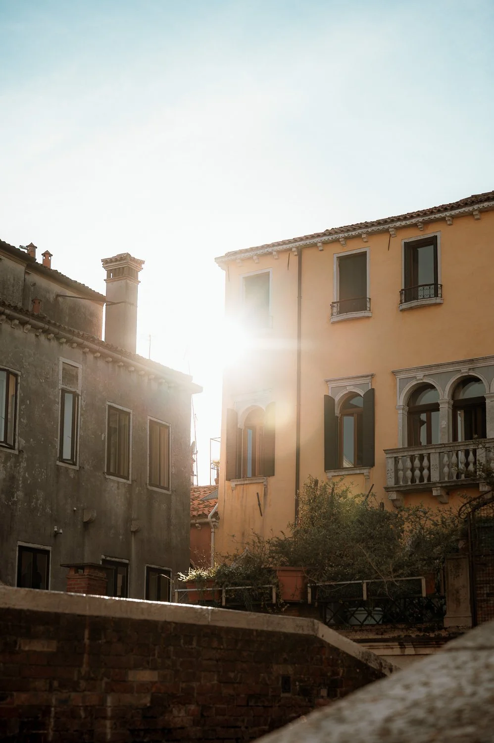 Sun Flare Over Ochre Palazzos.jpg