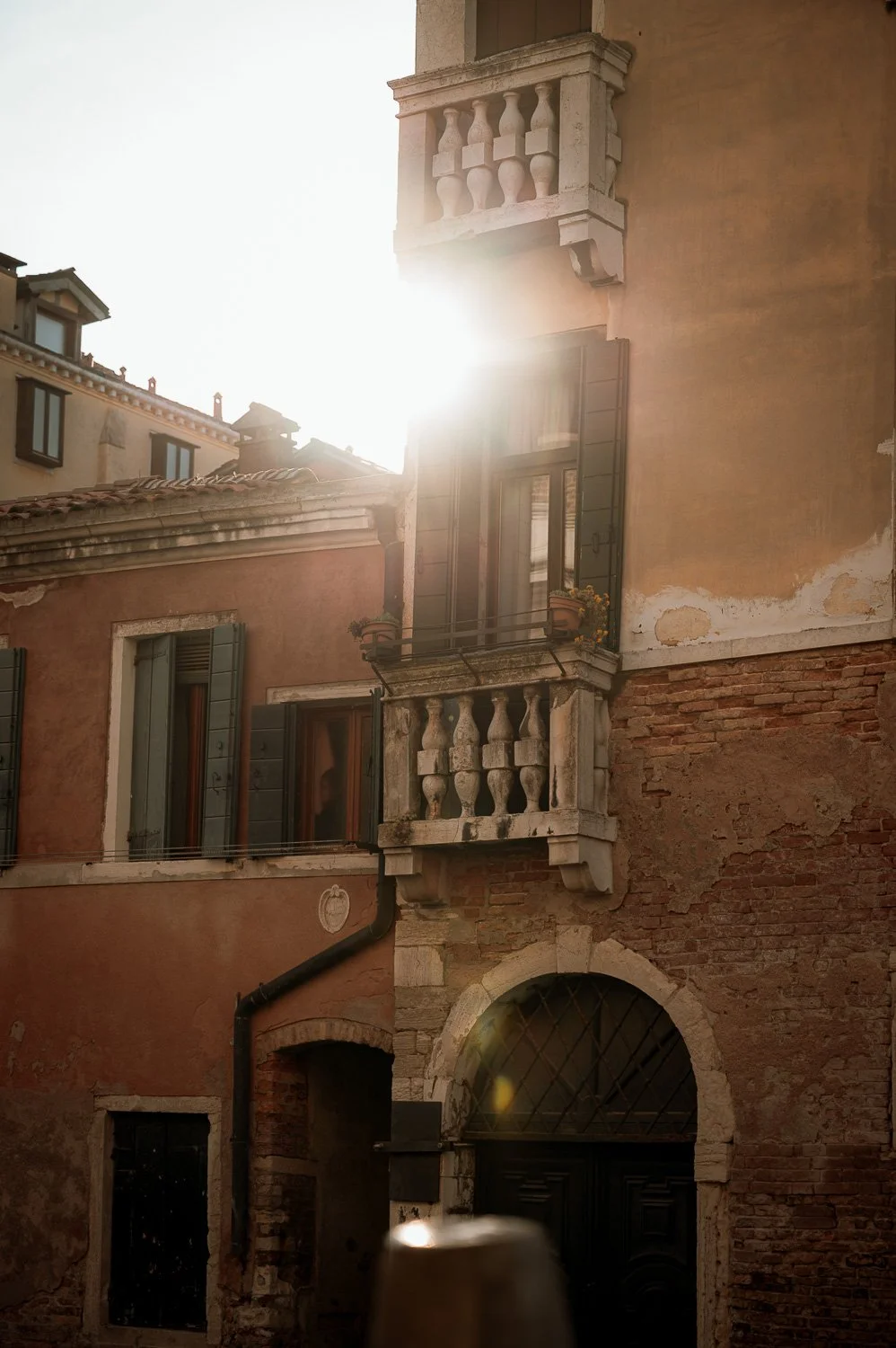 Sun Bursting Past Stone Balcony.jpg