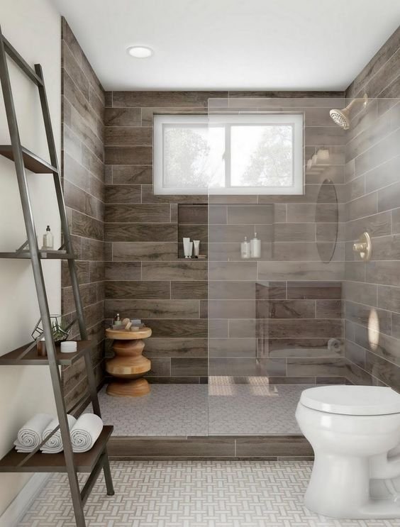 Walk-in shower with two walls and one fixed partition glass. Image via Pinterest