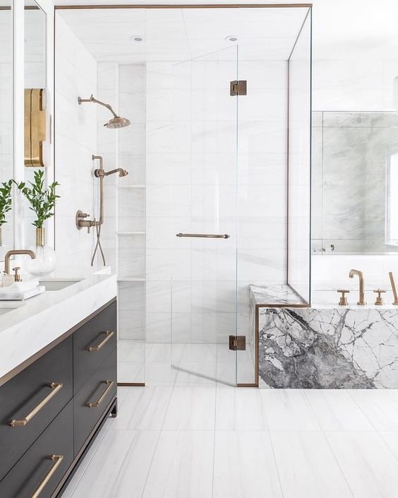 Luxury shower-bathtub combo with partition glass. Image via Pinterest