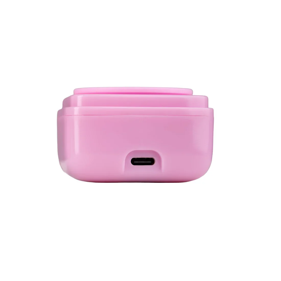 Close-up of the ZOLA Mini Wax Heater in light pink showing compact design and silicone wax cup
