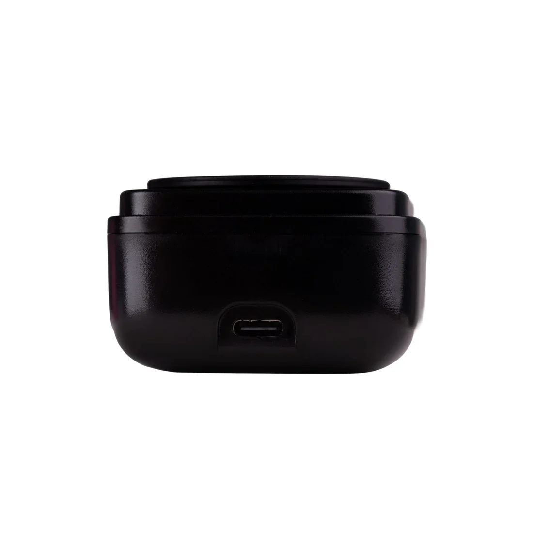 Close-up of the ZOLA Mini Wax Heater in black showing compact design and silicone wax cup