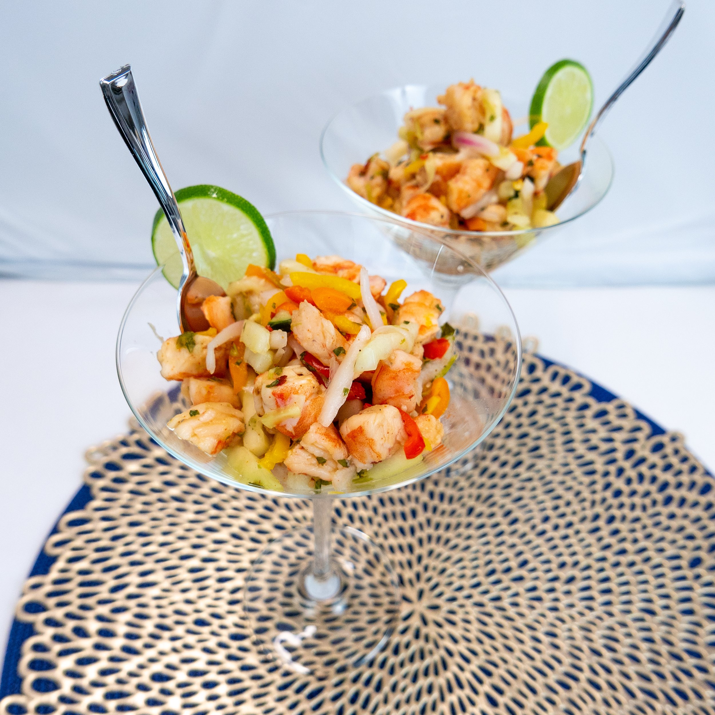 a photograph of JC's Gourmet's shrimp Chillin' Ceviche in martini glasses