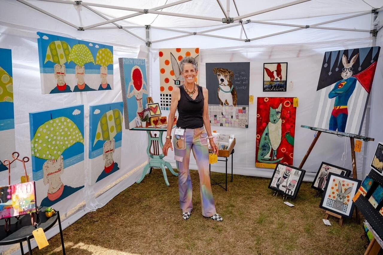photograph of artist renee broxson in her tent at ArtsQuest in Grand Boulevard in 2025