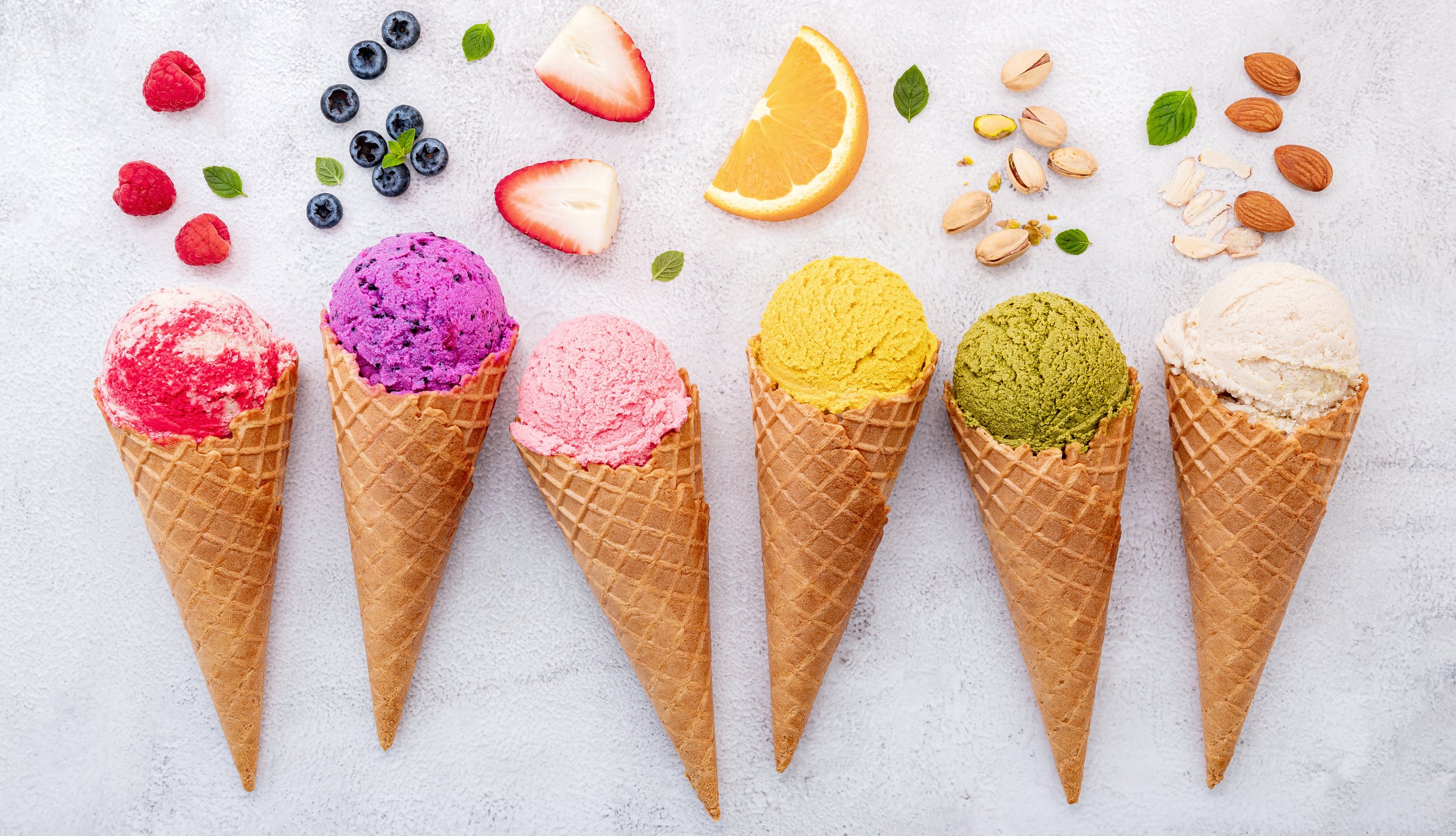 flat-lay-ice-cream-cones-collection-dark-stone-background.jpg