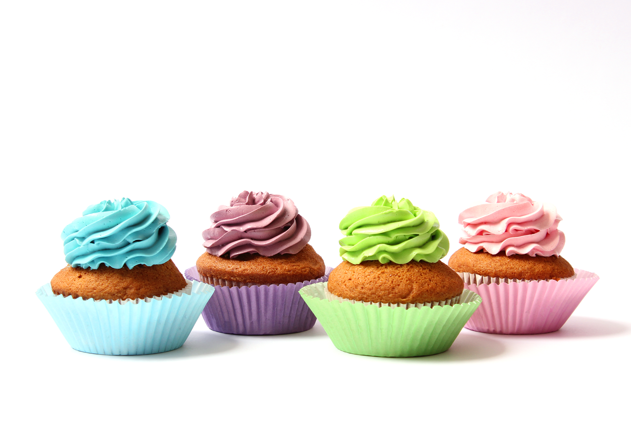 tasty-cupcakes-white-background-closeup_2400.png