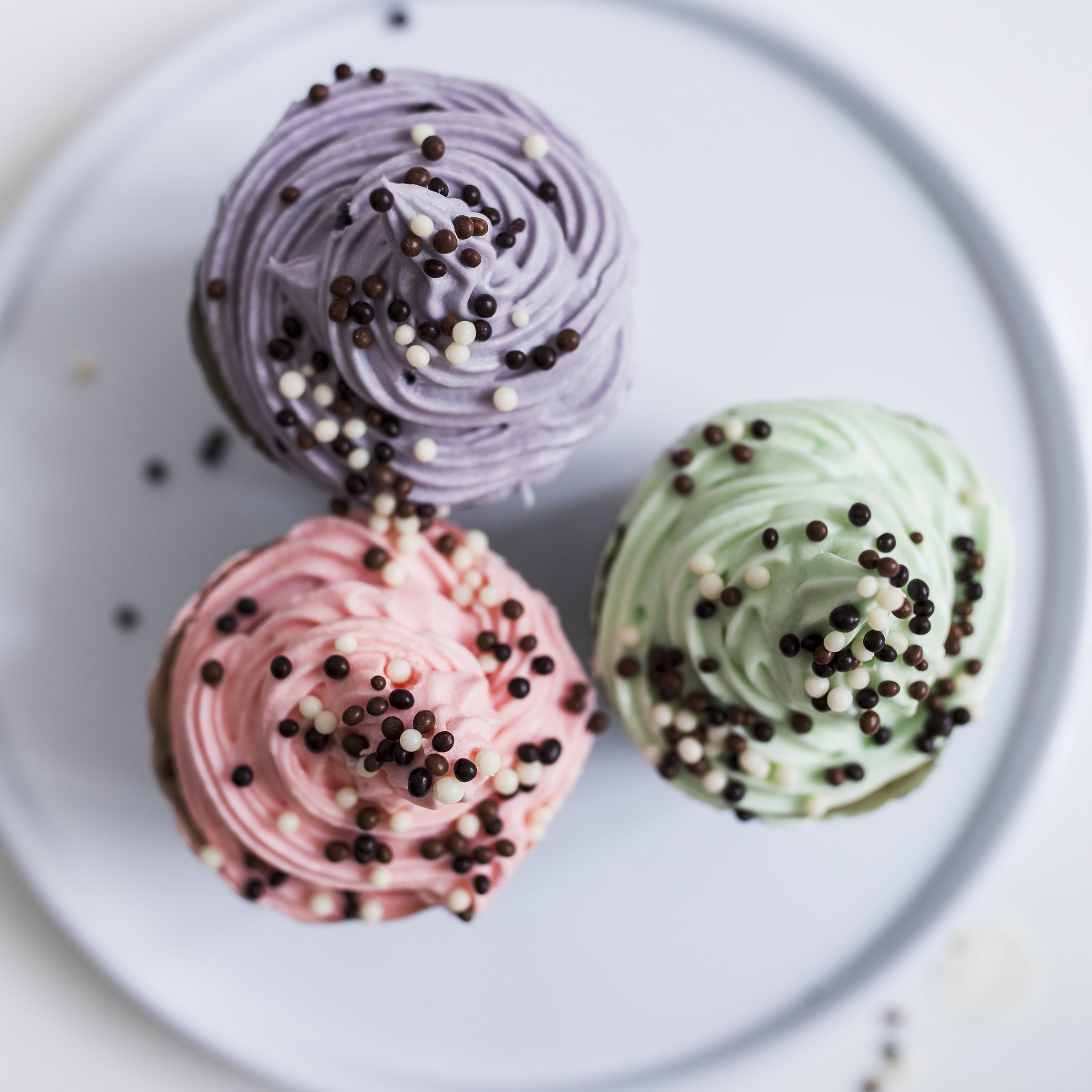 top-view-pastel-color-cupcakes-with-chocolate-balls_2400.png