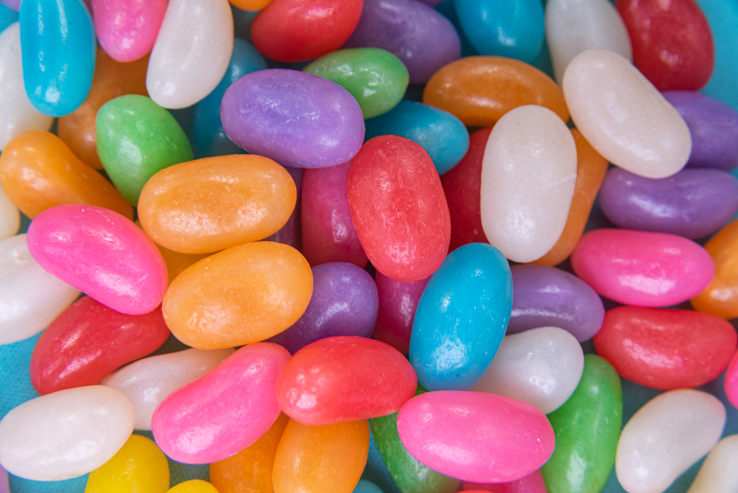various-jelly-beans-blue-background_2400.png