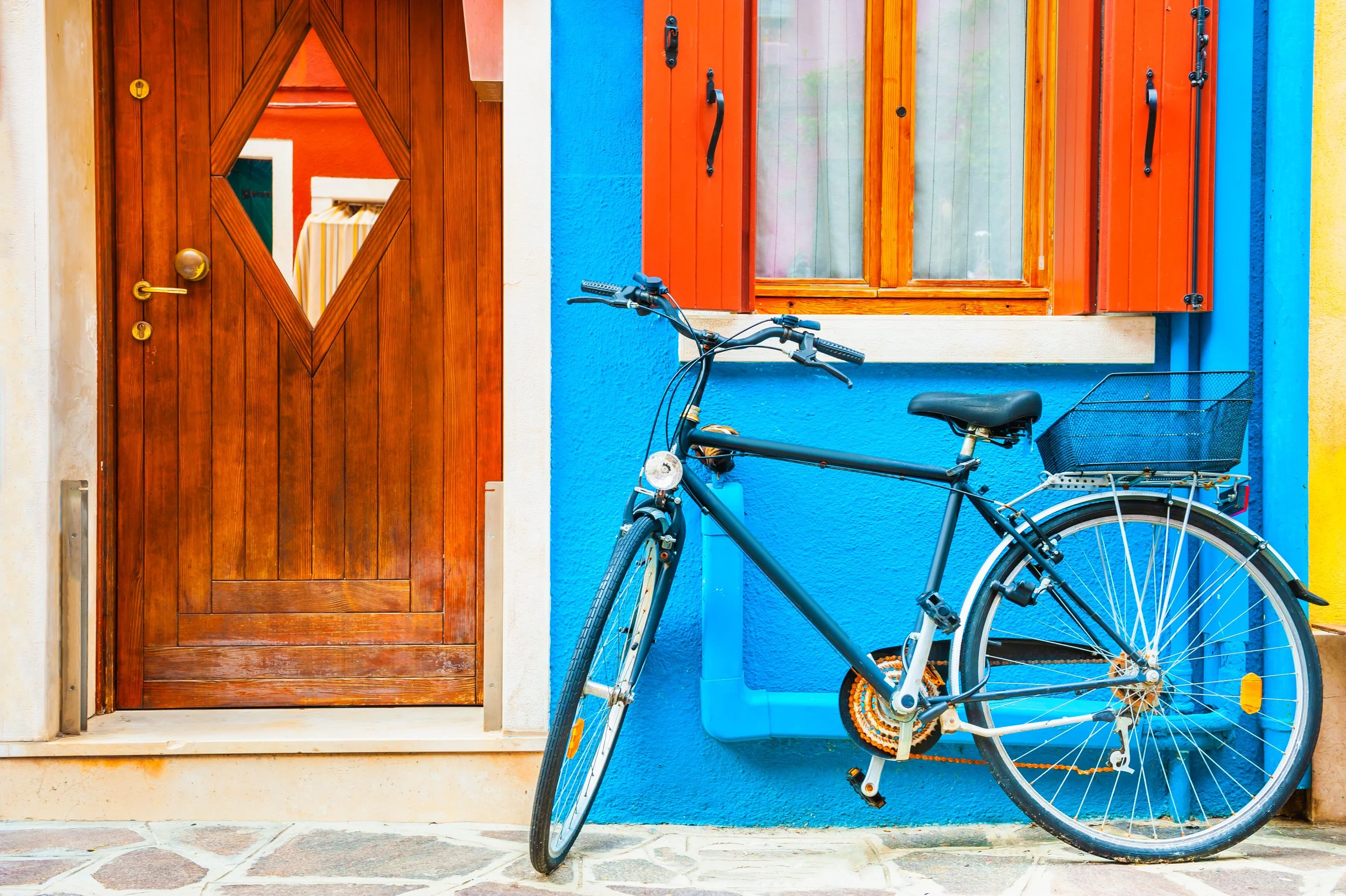 bicycle-parked-near-bluepainted-house-colorful-architecture-burano-island-venice-italy.jpg