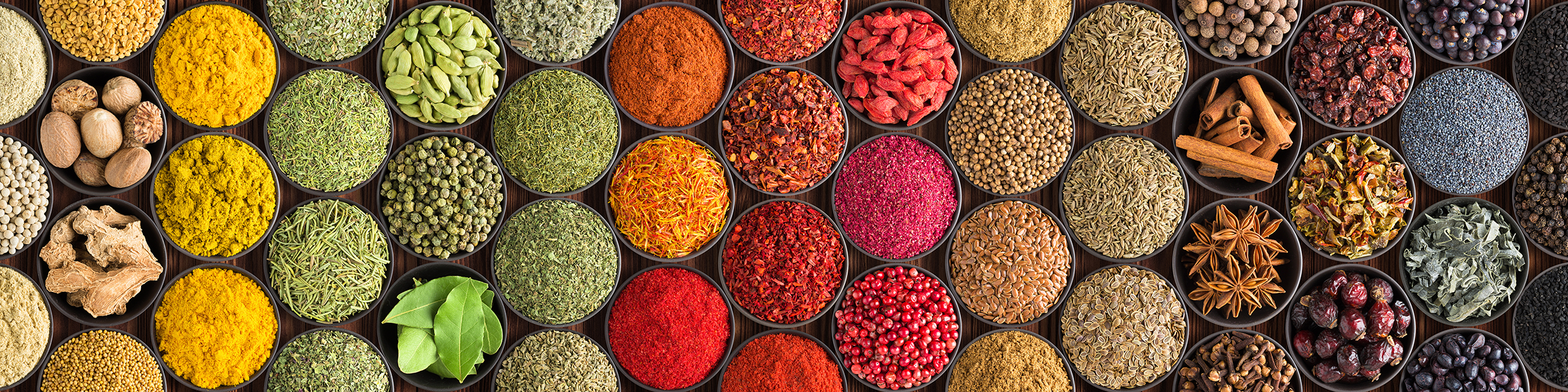 various-spices-herbs-as-background-colorful-condiments-cups-top-view_2400.png