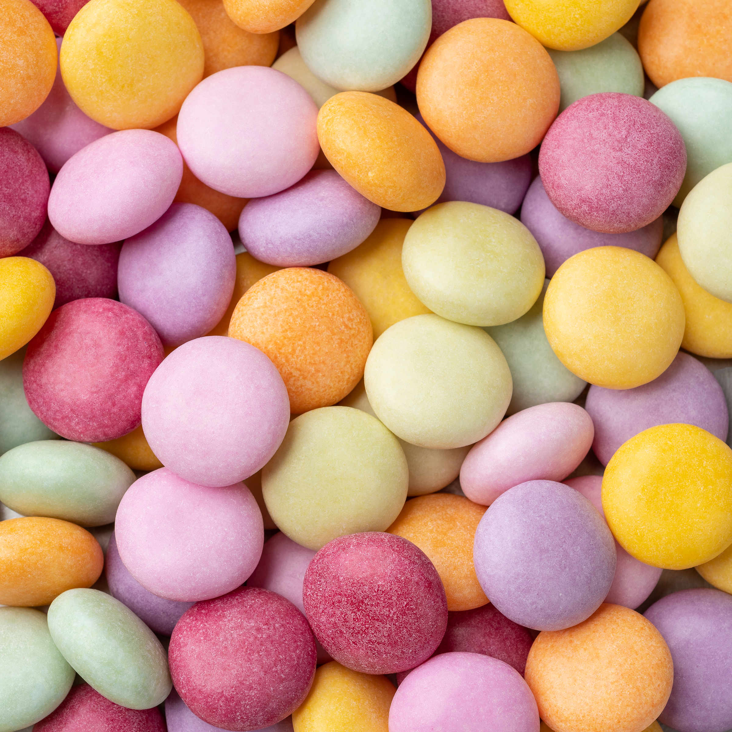 closeup-top-view-colorful-candies-candy-backdrop_2400.png