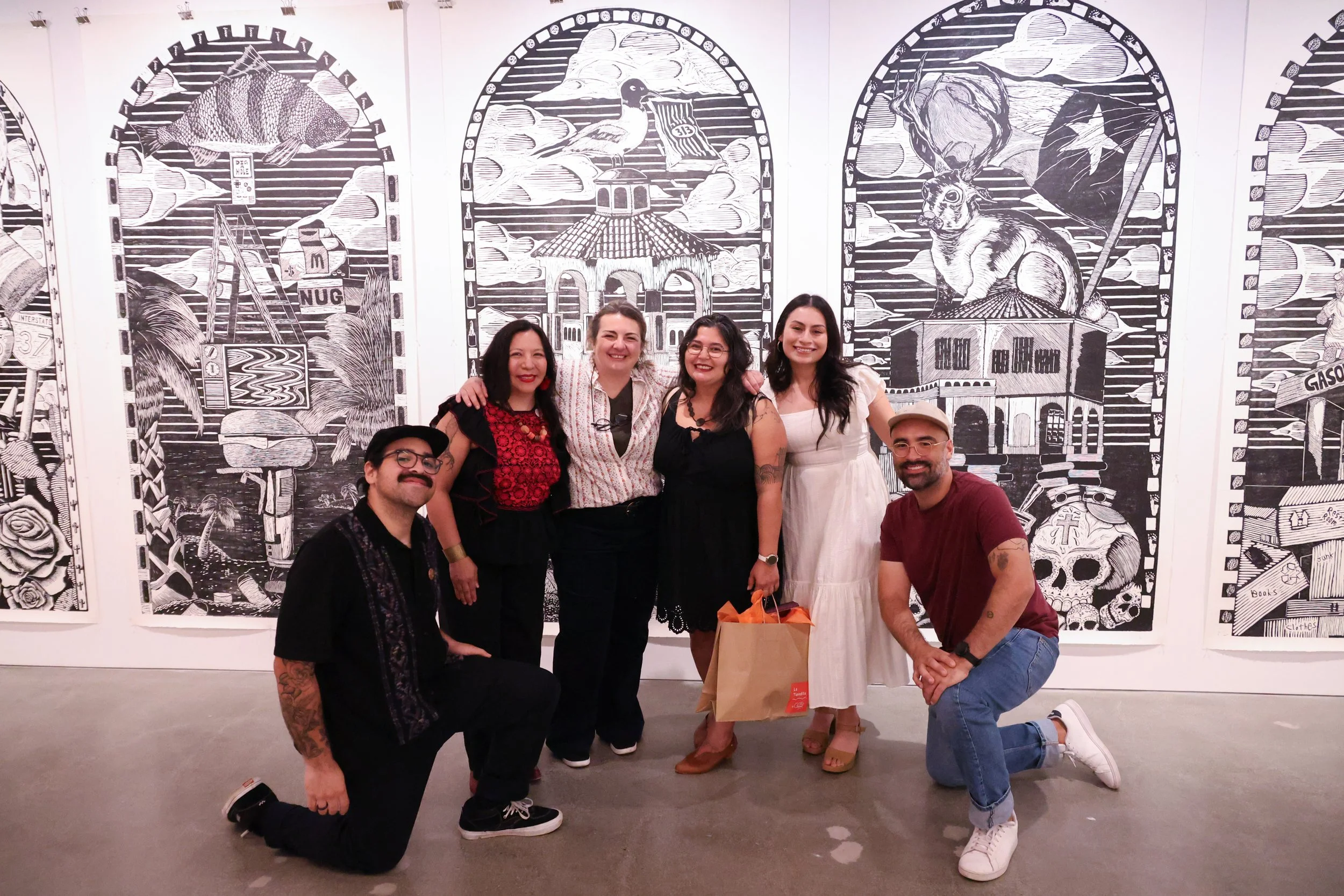 Soy de Tejas reception, in front of Ben Munoz's work, Ben, Tina, Karla, Jessica, Arely and Francisco