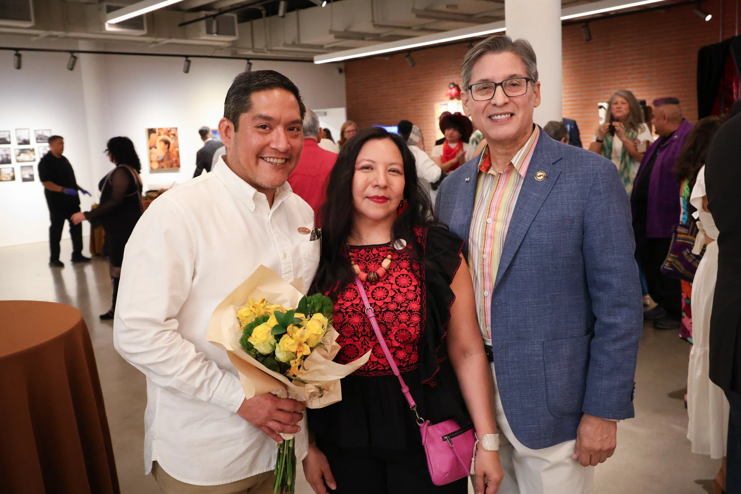 Curator Rigoberto Luna, Tina and collector Gustavo Hinojosa, Soy de Tejas, the Cheech, California