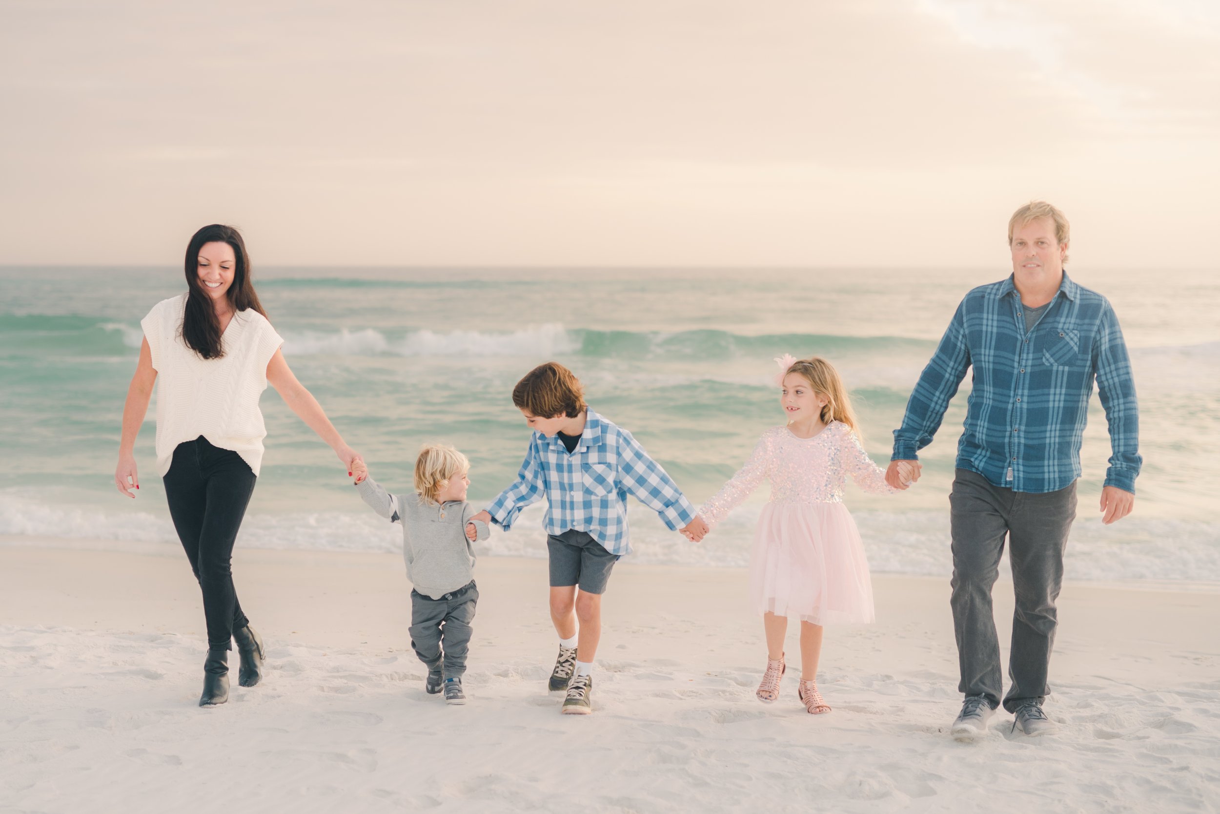 Walking Family Photo on the Beach In Destin Florida Taken By a Professional Photographer