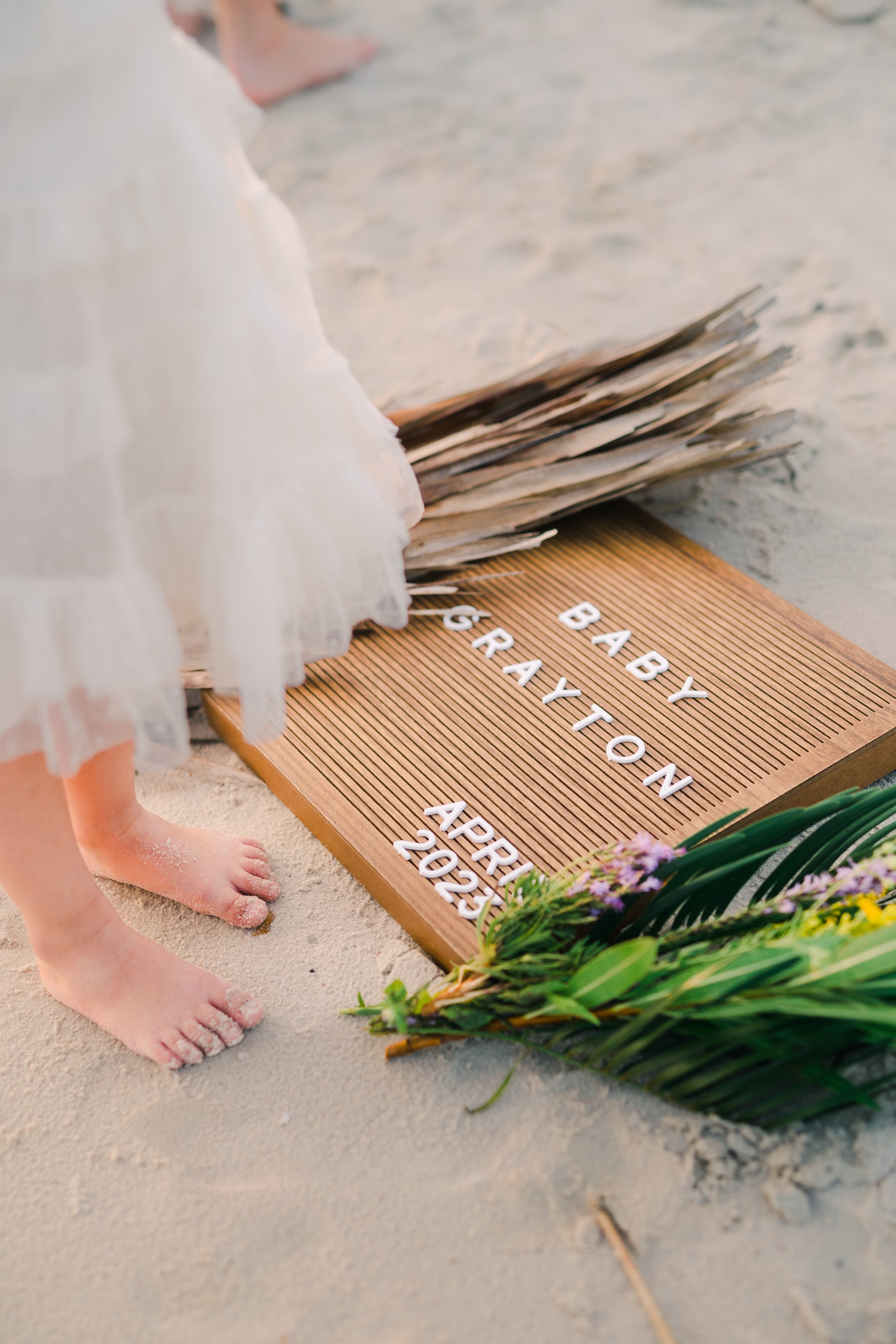 Photo of Pregnancy Announcement on the Beach In Cape San Blas Florida Taken By a Professional Photographer