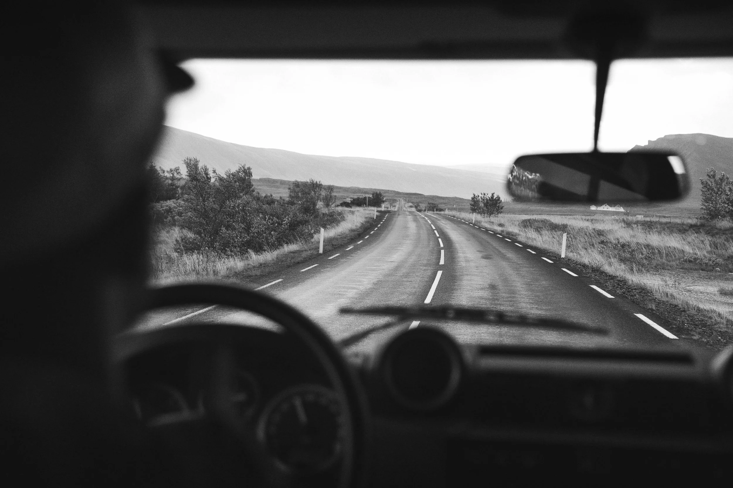 Roadway from the backseat of an SUV.