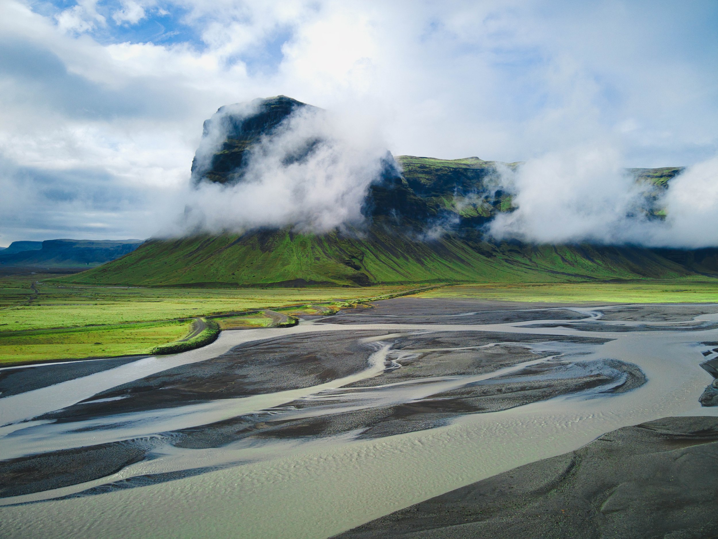 River cutting through the terrain in Iceland.