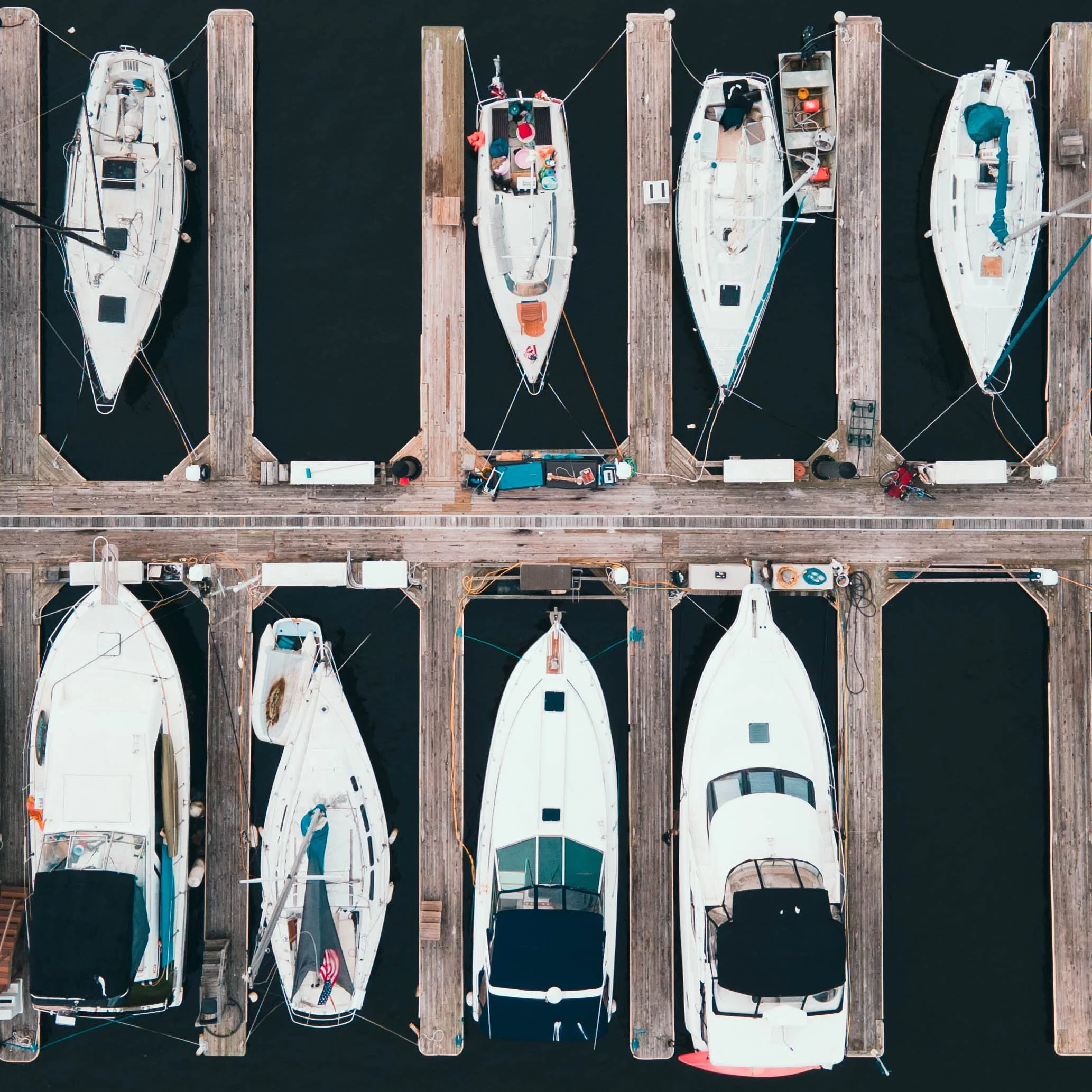 Aerial view of boats in boat slips.