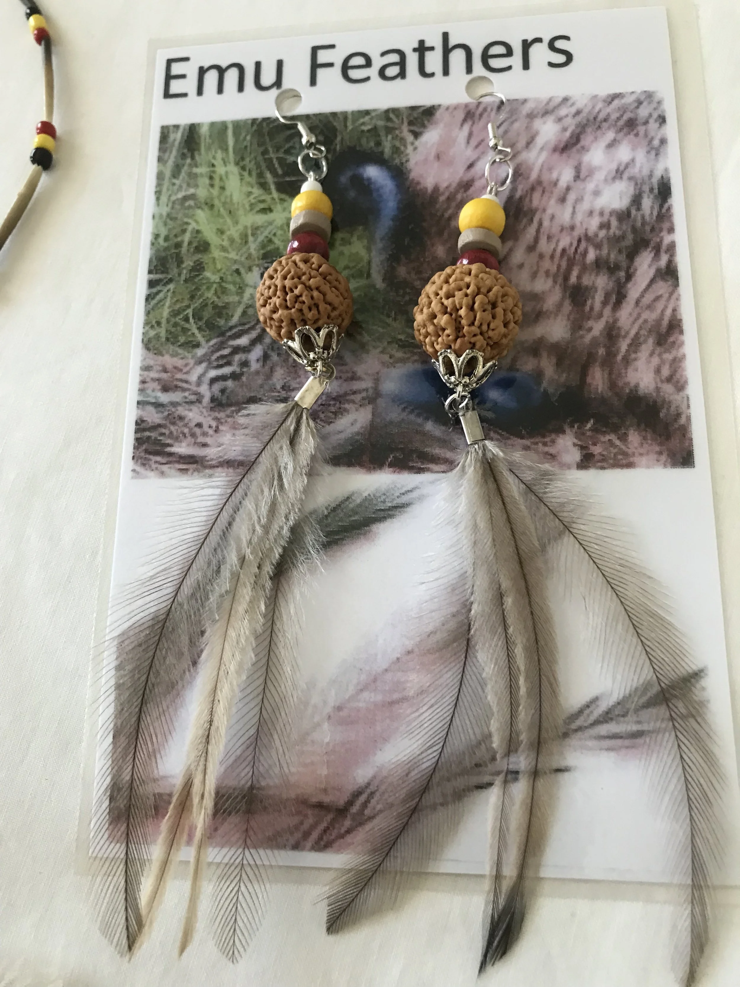 Emu Feather earrings with Sally Beale