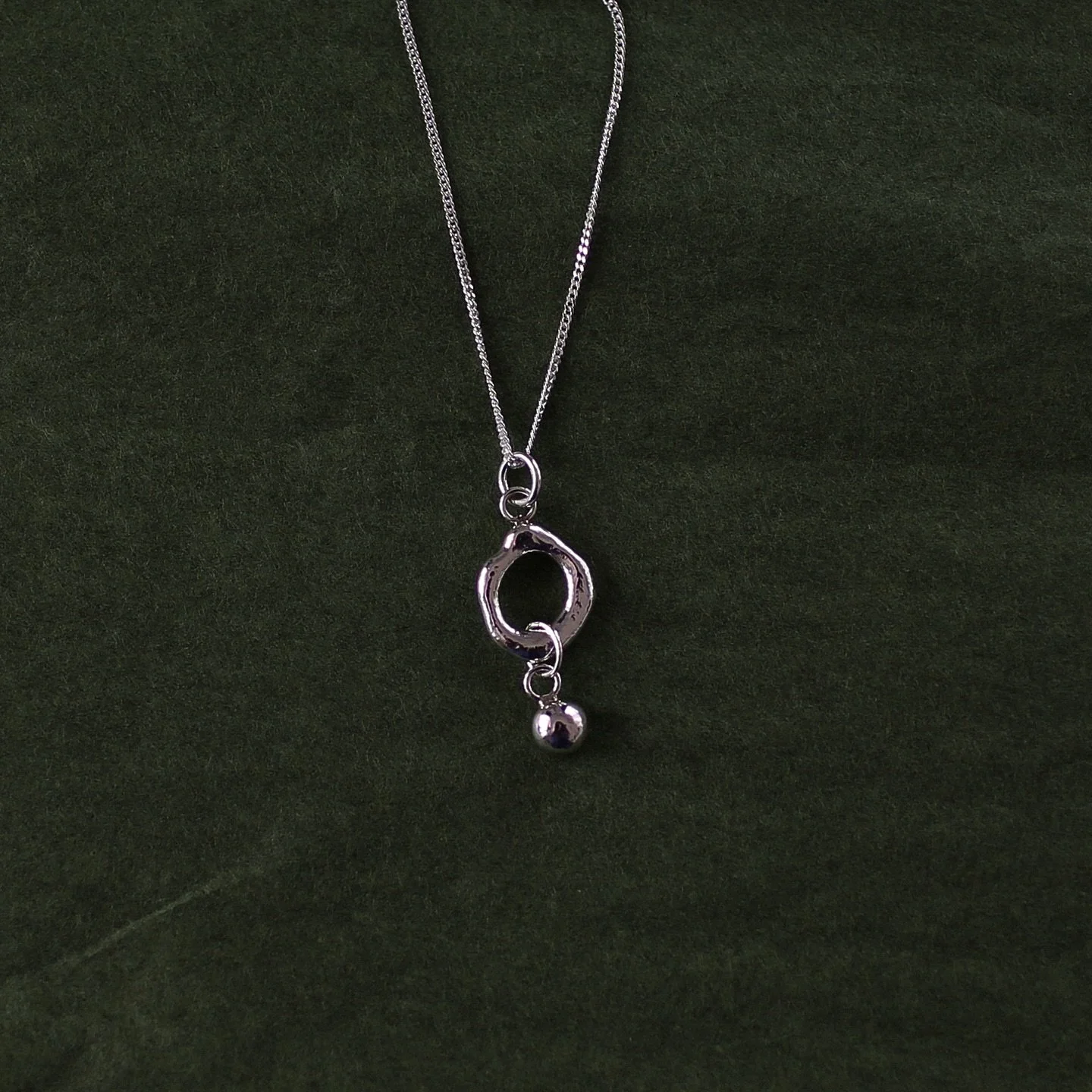Recycled sterling silver, melted and shaped into a molten form&mdash;finished with a silver drop for added movement and charm.🩶

Shop in person at @cafe_halcyon or online&mdash;link in bio.

.
.
.

#solmayjewelry #moltensilver #moltensilverjewellery