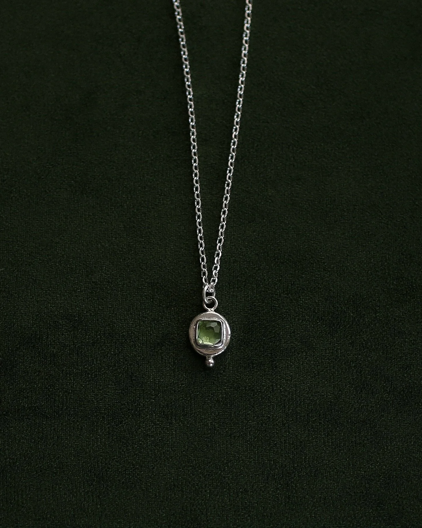 Nova pendant ~ green tourmaline set on molten silver 💚

.
.
.

#solmayjewelry #pendantnecklace #greenandsilver #oneofakindjewelry
