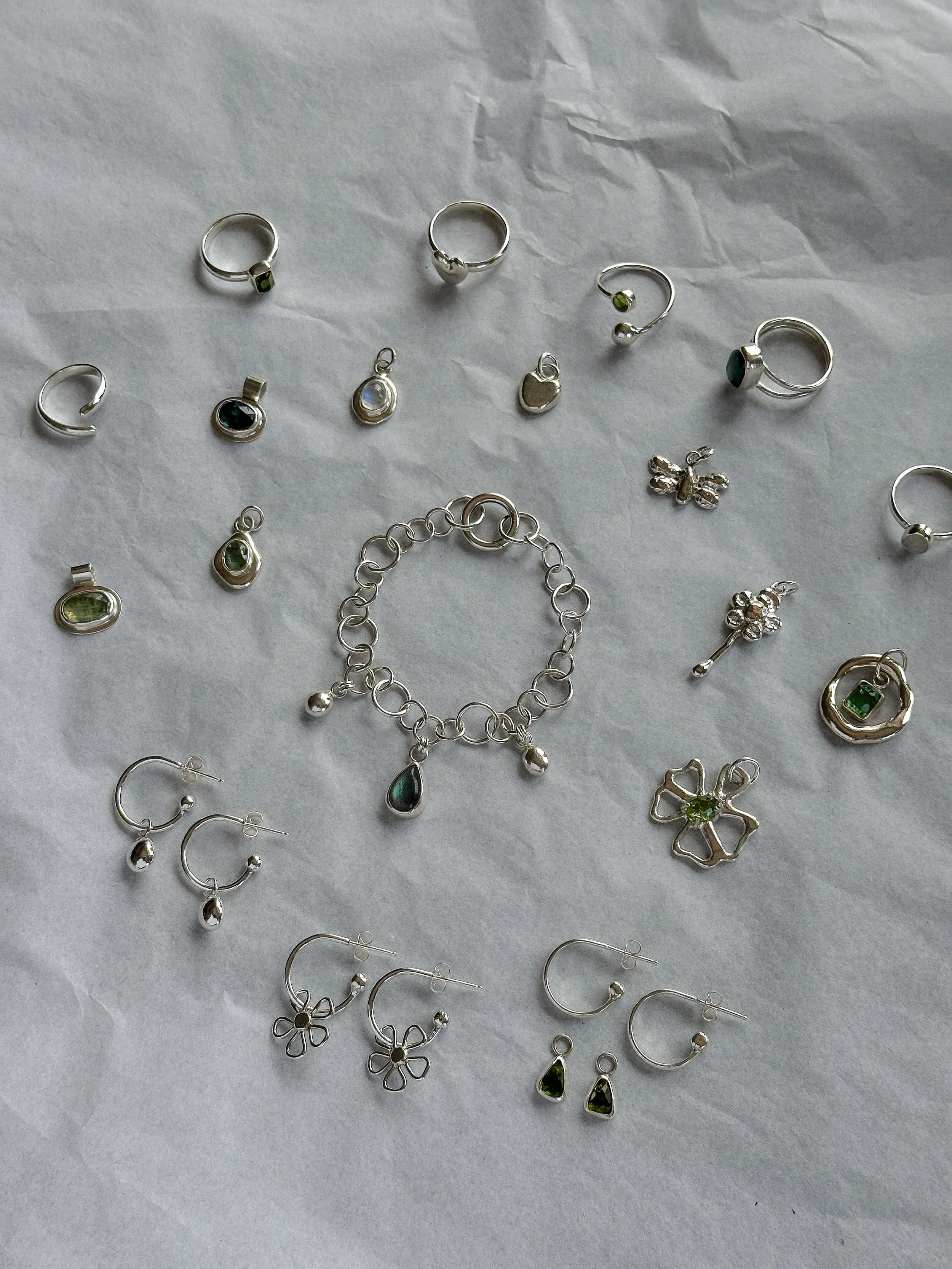 dreamscape collection ~ coming june 5th 🩶🍀🌷🌧️💧🐝✨

consisting of:
&bull; 9 pendants
&bull; 6 rings
&bull; 3 charm earrings
&bull; 1 chain bracelet

I&rsquo;m obsessed with every piece 🥹