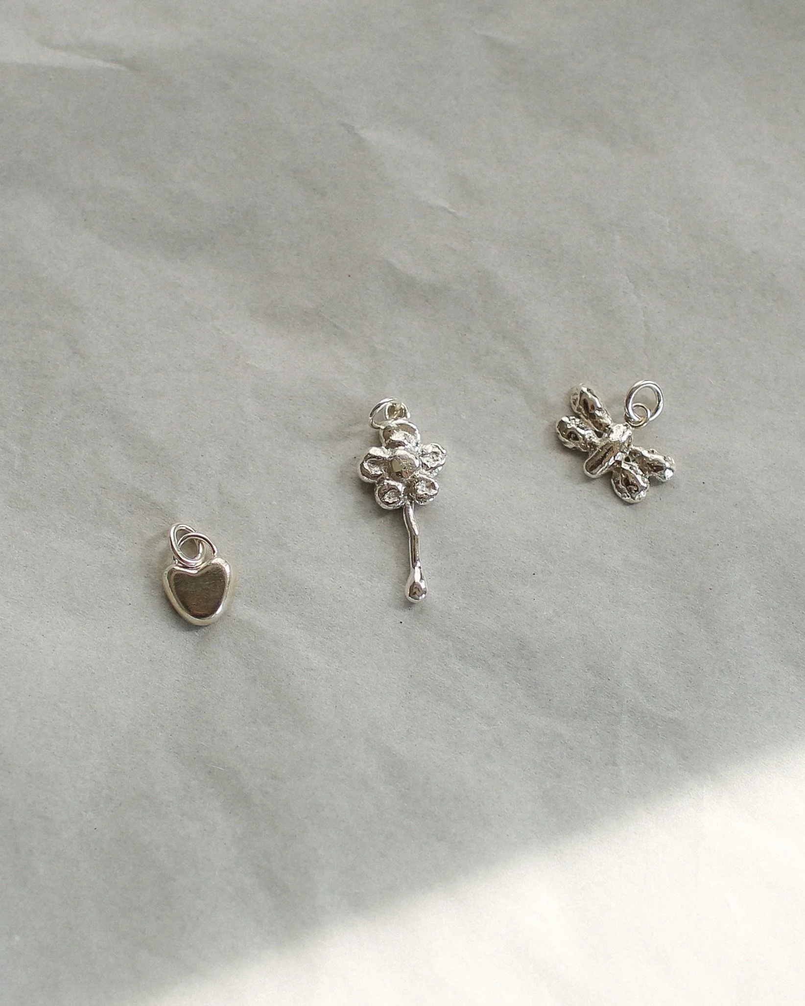 Probably my favorites from this collection 🩶 hand formed pendants ~ featuring:

&ldquo;Garden key&rdquo;
&ldquo;Found a friend&rdquo; *sold* 
&ldquo;Whole heart&rdquo; *sold*
