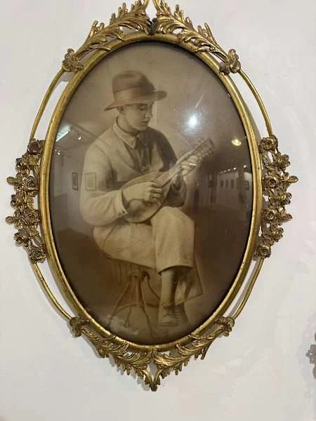 "Boy Playing Mandolin (cir. late 19th or early 20th-century)" by Unknown Photographer
