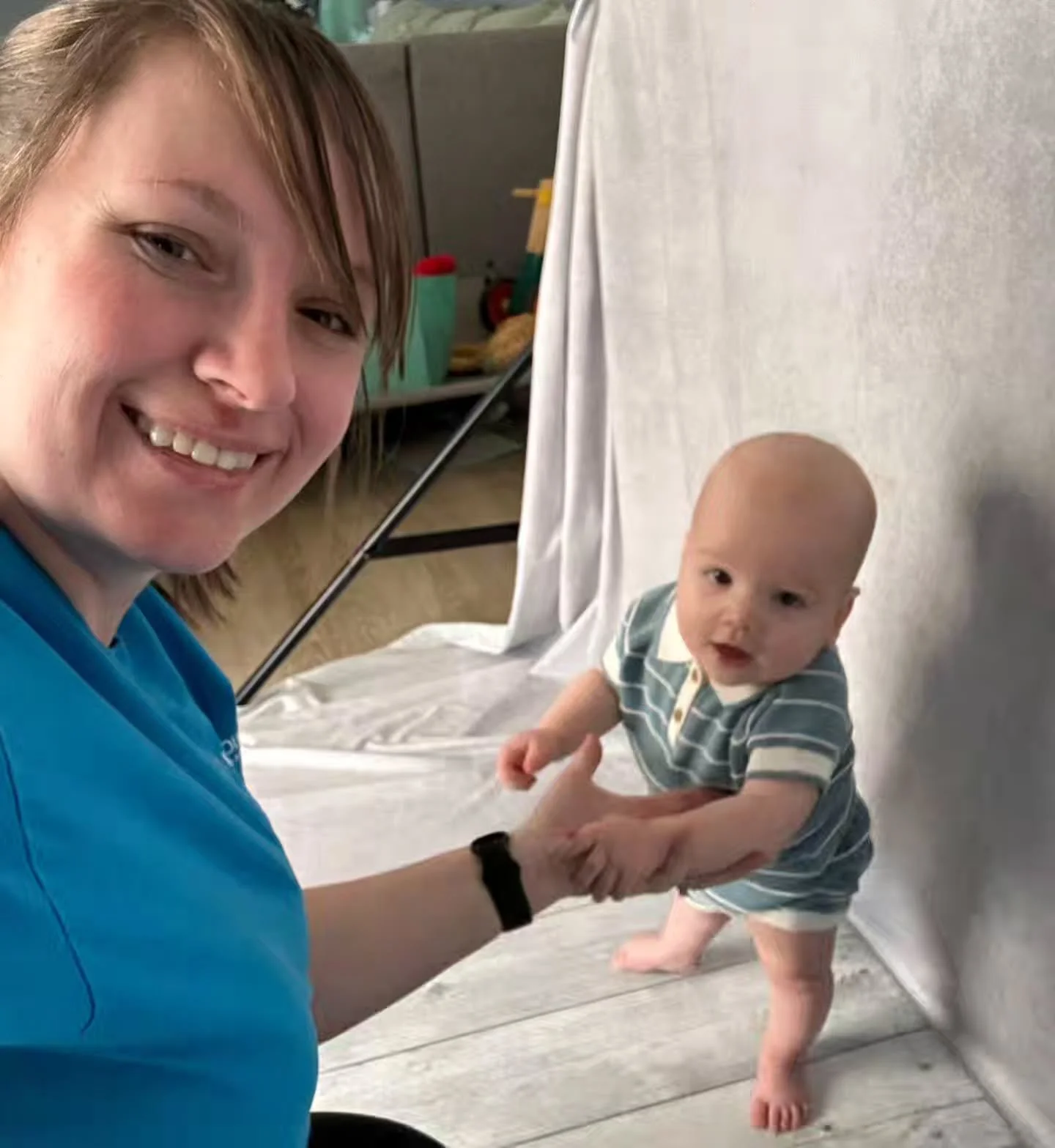 Elrich and me hanging out at his 9 month shoot today! Little man was all about showing off his standing skills.