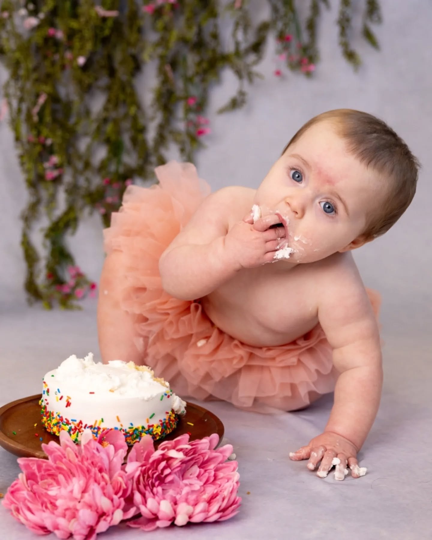 One full year of Miss Rowyn! 

Somehow it's already been a full year since she made her appearance. She wasn't quite sure about the cake smash at first, but eventually came around. 

Cheers to one year of sweet Rowyn! 🥂